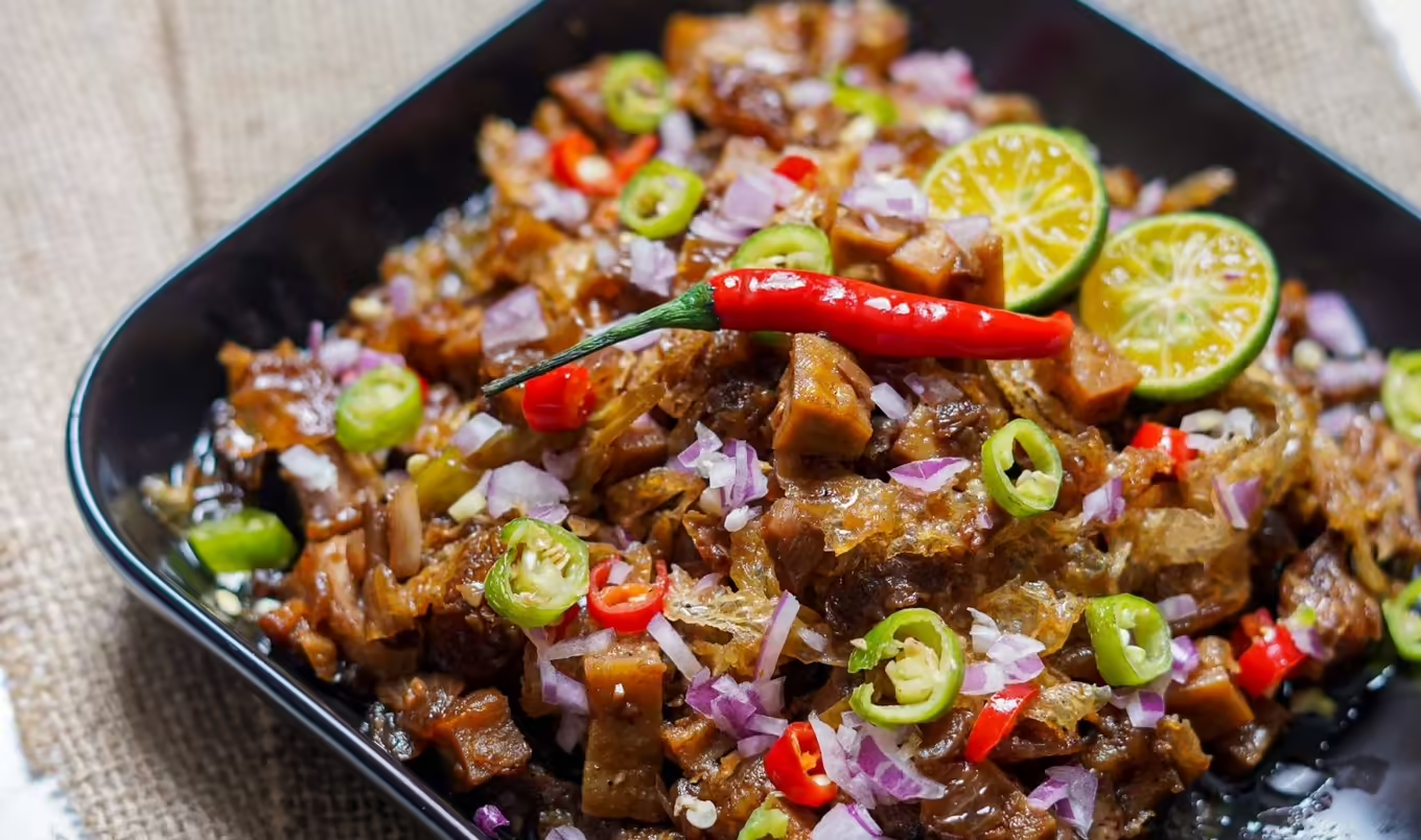 Photo of sizzling tofu and mushroom.